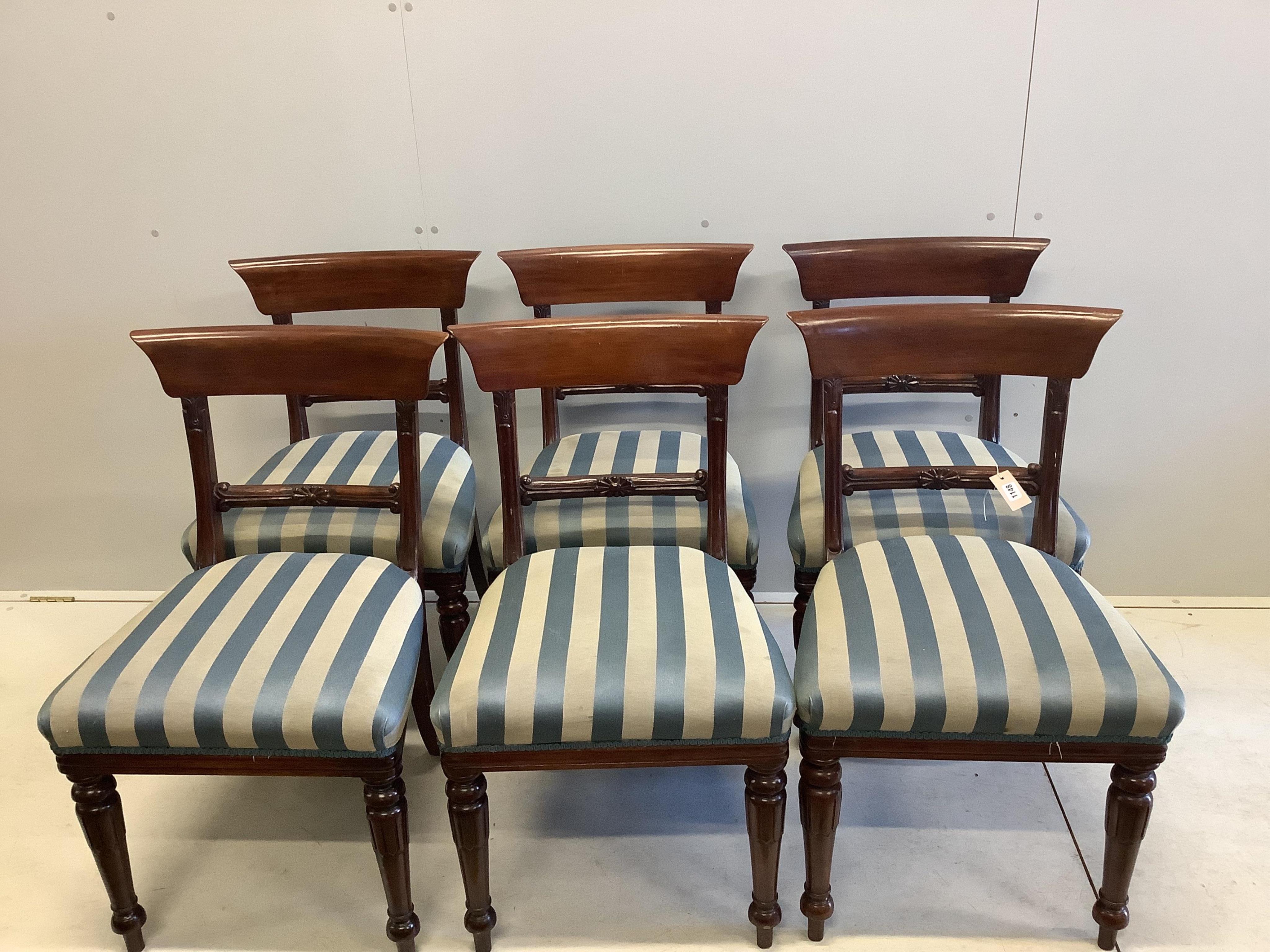 A set of eight William IV style mahogany dining chairs, two with arms. Condition - fair to good